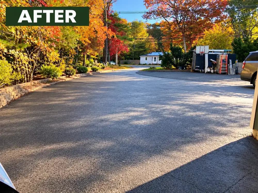 Driveway cleared of fall leaves after a cleanup at a Massachusetts home