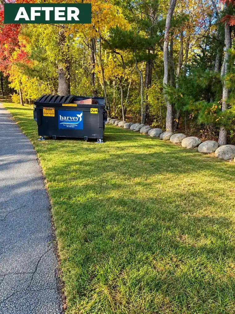 Side yard and dumpster area after debris removal